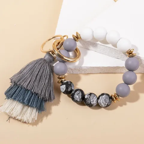 Portachiavi con Perline in Silicone Bohemian Bracciale a Nappa con Perline a Fiori per Donna Accessorio Gioielli di Moda