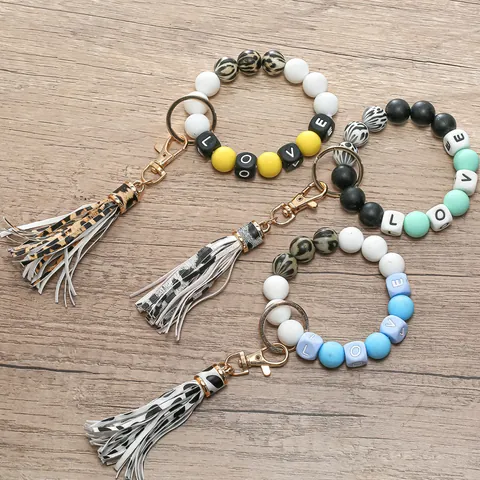 Bracciale Portachiavi in Silicone con Perline e Nappina Leopardata Perline con Lettere LOVE Portachiavi da Polso da Donna Fatto a Mano