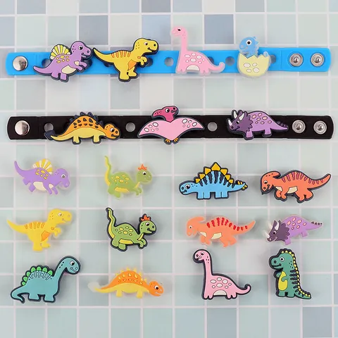 Ciondoli per Scarpe in PVC a Forma di Dinosauro Luminoso per Sabot Decorazione Cartone Animato Glow In The Dark Fai Da Te Bambini