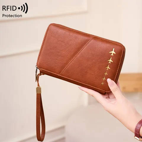 Protège Passeport Anti RFID Portefeuille de Voyage en Cuir PU Organisateur de Documents avec Fermeture Éclair Décor Avion et Dragonne
