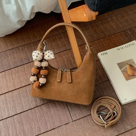 Vintage Minimalist PU Leather Half Moon Handbag For Women Maillard Style Shoulder Bag Versatile Crossbody Bag With Pom Pom Charm
