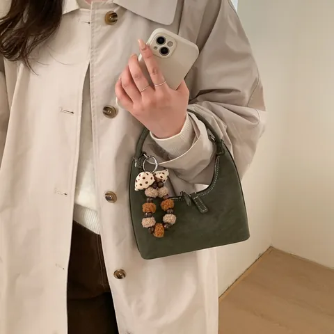 Vintage Minimalist PU Leather Half Moon Handbag For Women Maillard Style Shoulder Bag Versatile Crossbody Bag With Pom Pom Charm