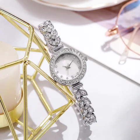 Elegant Women Bracelet Watch Silver Alloy Small Round Dial Rhinestone Leaf Shaped Strap Roman Numerals Quartz Watch Gift