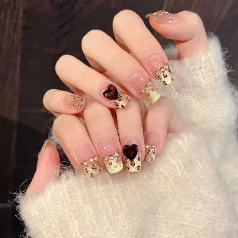 Unghie Finte da Applicare Fatte a Mano di Lusso con Stampa Leopardata e Gemma a Cuore Strass Glitter Oro per Donna