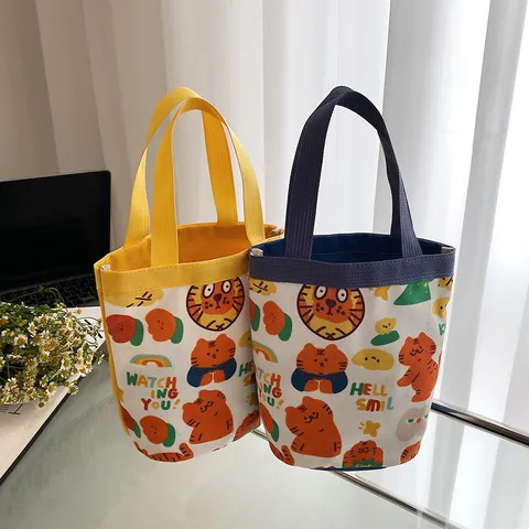 Sac Seau en Toile avec Imprimé Tigre de Dessin Animé Mignon Sac à Main Cylindrique Portable pour Étudiants Femmes Casual