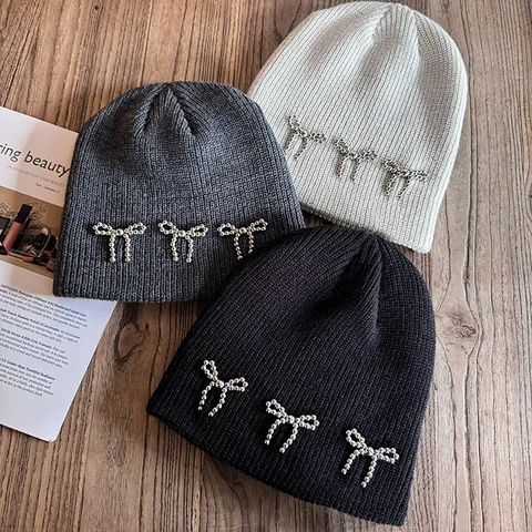 Women's Beaded Bow Ribbed Knitted Beanie Soft Acrylic Warm Winter Hat For Autumn Daily Casual Fashionable Solid Color Skull Cap