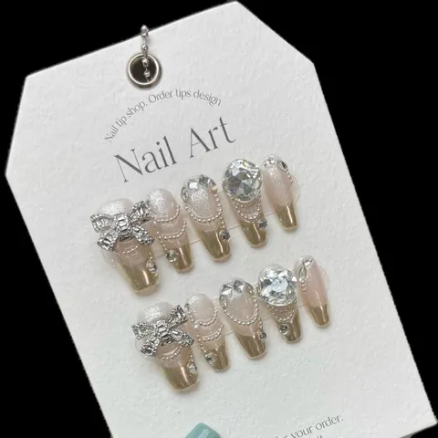 Handgefertigte Luxus Press-on-Nägel Lange Sarg-Form Champagner Gold Silber Schleife Strass Kristall Französischer Stil Künstliche Nägel