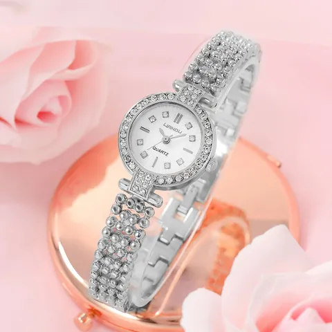 Orologio al Quarzo da Donna Elegante Cassa in Lega con Strass Quadrante Circolare Cinturino a Grani in Acciaio Inossidabile