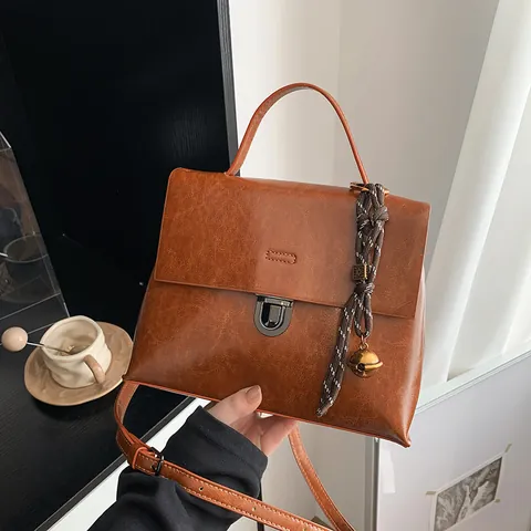 Retro PU Leather Handbag For Women Vintage Messenger Bag With Woven Bell Charm Casual Versatile Crossbody Shoulder Bag
