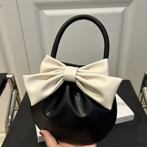 Bolso de Mano Redondo Pequeño con Lazo Grande para Mujer 2025 Invierno Nuevo Color en Contraste Cuero PU Estilo Dulce Bolso de Fiesta Diario