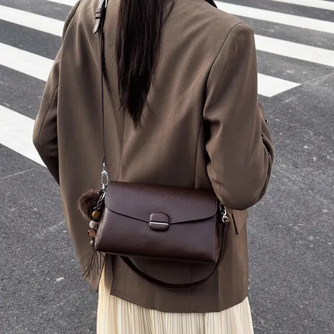 Women Minimalist PU Leather Small Square Bag Vintage Crossbody Shoulder Bag With Pom-pom Pendant Solid Color Fashion Daily Commuter Satchel
