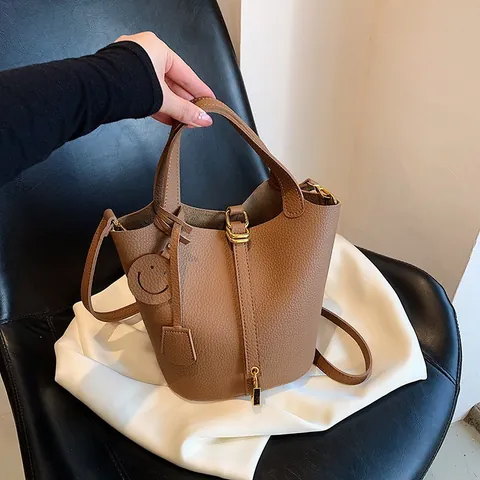 Women Minimalist Litchi Grain Synthetic Leather Bucket Bag With Gold Padlock Smiley Charm Handbag Shoulder Crossbody Purse