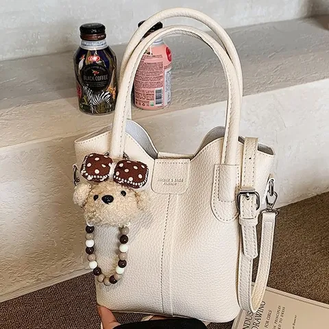 Women PU Leather Lychee Texture Bucket Bag Casual Handbag Crossbody Bag With Cute Teddy Bear Charm And Beaded Chain Top Handle Bag