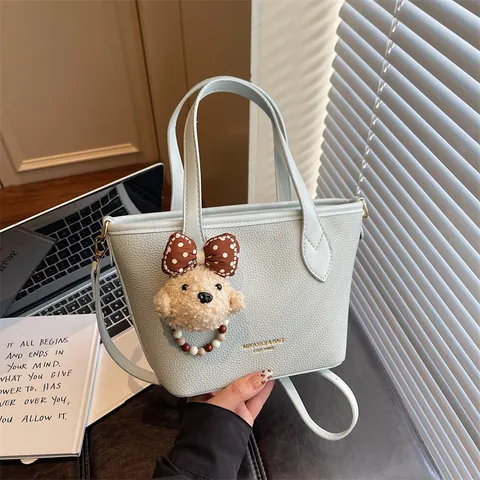 Korean Style Pebble Grain PU Leather Bucket Bag For Women Niche Design Commuting Tote Shoulder Crossbody Bag With Plush Bear Charm