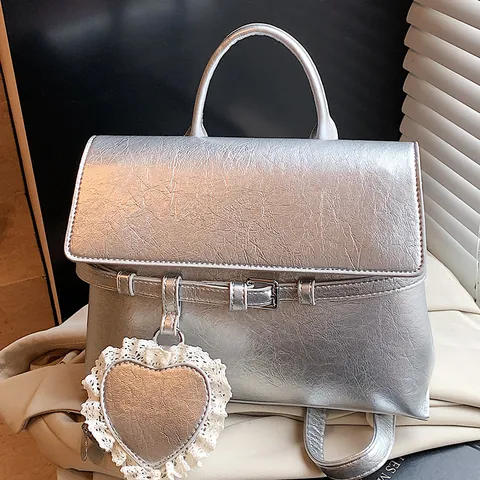 Damen Mode PU Leder Rucksack Vielseitige Handtasche Umhängetasche Herz Spitzenanhänger Lässige Reisetasche für Damen