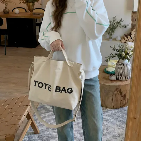 Vintage Women Canvas Tote Bag Large Capacity Letter Print Shoulder Bag Crossbody Handbag With Adjustable Strap For Daily Commute