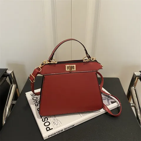 Bolso de Hombro Trapezoidal de Cuero PU para Mujer Bolso de Mano Con Cierre Giratorio Bolso de Mensajero Color Sólido