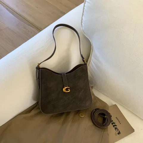Damen Retro Minimalistisch PU-Leder Wildleder Umhängetasche Mit Goldener Buchstaben-G-Schnalle Mode Pendeln Hobo Tasche
