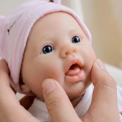 12 Inch Realistic Full Body Solid Silicone Reborn Baby Doll Washable Soft Stretchable Girl Doll With Pink Frog Outfit Set