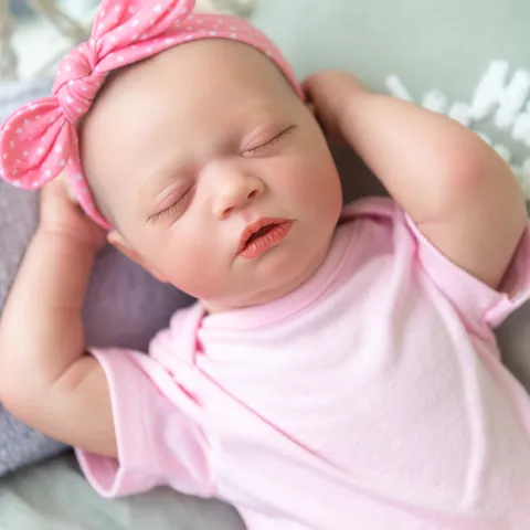 Realistic Reborn Baby Doll 19 Inch Sleeping Newborn Girl Doll With Pink Polka Dot Headband And Romper Hand Painted Vinyl
