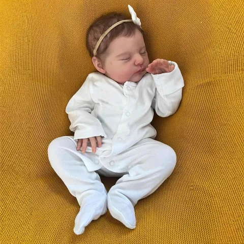 Muñeca Bebé Reborn Realista de 19 Pulgadas Recién Nacido Durmiendo Con Mameluco Blanco y Diadema de Lazo Silicona Cuerpo de Tela Juguete Realista