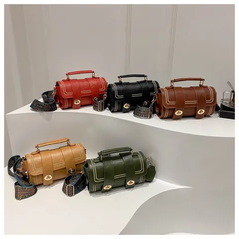 Women PU Leather Cylinder Crossbody Bag With Rivet Double Swivel Lock And Wide Ethnic Pattern Strap Vintage Handbag