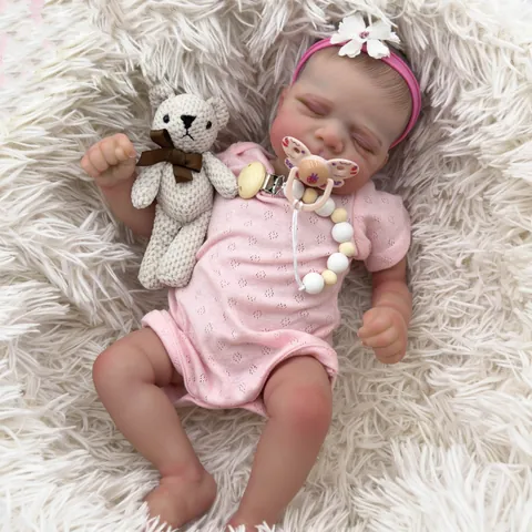 Poupée Reborn Réaliste Tête et Membres en Silicone Corps Souple en Tissu Nouveau-Né Dormant Avec Vêtements Roses Accessoires Jouet