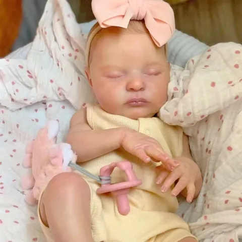 Realistic Reborn Baby Doll Laura Sleeping Soft Vinyl Limbs Cloth Body Handmade Hand Painted Hair With Yellow Romper Headband Plush Toy Pacifier