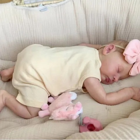 Realistic Reborn Baby Doll Laura Sleeping Soft Vinyl Limbs Cloth Body Handmade Hand Painted Hair With Yellow Romper Headband Plush Toy Pacifier