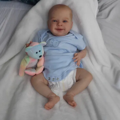 Lifelike Reborn Baby Doll Smiling Newborn Boy With Blue Clothes Hat Bib Set Handmade Painted Hair Vinyl Cloth Body Toy Gift