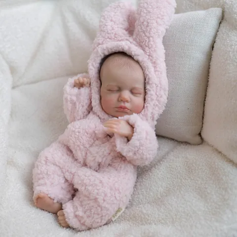 Bambola Reborn Realistica in Vinile Corpo Intero Bimba che Dorme Con Pagliaccetto in Peluche Rosa a Forma di Coniglio Regalo