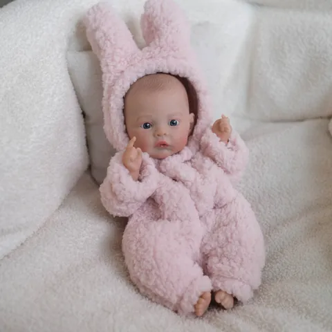 Bambola Reborn Realistica Con Grenouillère in Peluche Rosa a Forma di Coniglio Corpo in Vinile Morbido Regalo Bambina