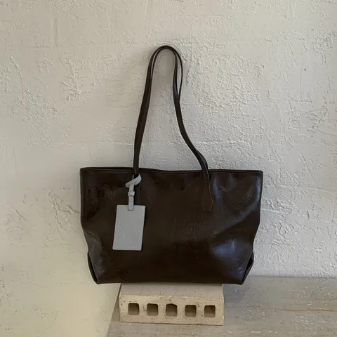 Damen Große Kapazität PU Leder Tragetasche Minimalistisch Retro Lässig Schultertasche Mit Welpenanhänger Mode Pendler Handtasche