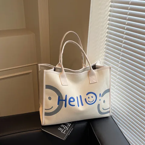 Sac Fourre-Tout en Toile pour Femmes Grande Capacité Minimaliste Hello Smile Motif Sac à Main Mode Style Coréen Sac à Bandoulière