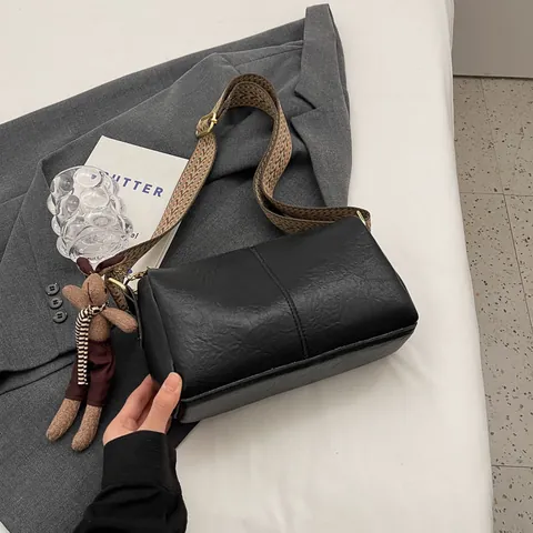 Women Vintage PU Leather Pillow Crossbody Bag Wide Jacquard Strap Small Boston Shoulder Bag With Plush Rabbit Pendant