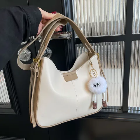 Women's PU Leather Contrast Color Shoulder Bag Minimalist Hobo Underarm Bag With Plush Monster Pendant Design Casual Tote Bag