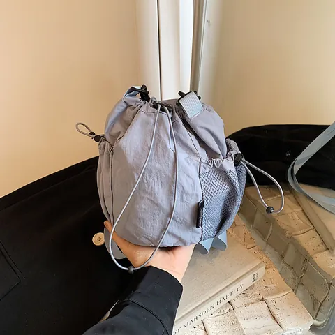 Women Lightweight Nylon Drawstring Bucket Bag Minimalist Crossbody Shoulder Bag With Side Mesh Pocket For Travel Daily Casual