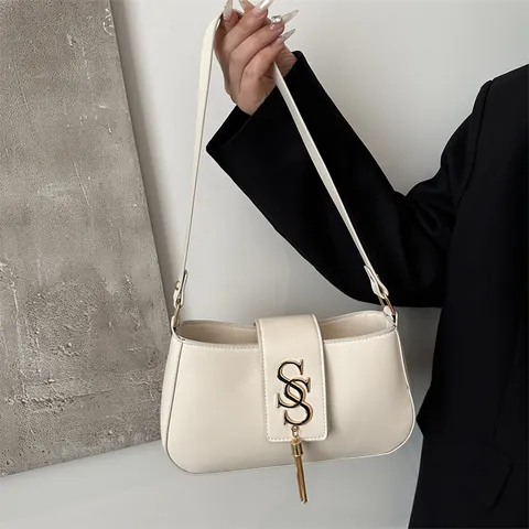 Bolso de Axila de Cuero PU Vintage para Mujer Minimalista Color Sólido Bolso de Hombro Con Logo S de Metal y Borla Moda