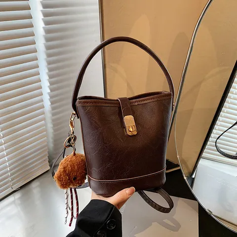 Vintage PU Leather Bucket Bag For Women Retro Contrast Color Top Handle Bag With Puppy Pendant Crossbody Shoulder Bag