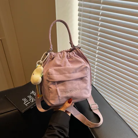 Korean Style Nylon Pleated Drawstring Bucket Bag For Women Fashion Minimalist Shoulder Bag With Plush Charm Accessory