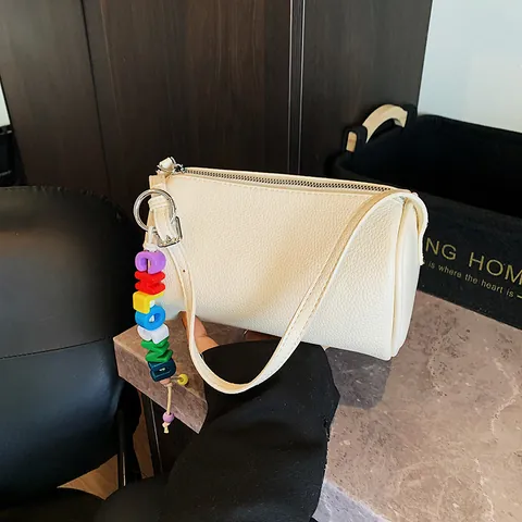 Women's Niche Retro PU Leather Barrel Bag Lychee Pattern Simple Pillow Crossbody Bag With Colorful Letter Pendant Fashion Shoulder Handbag