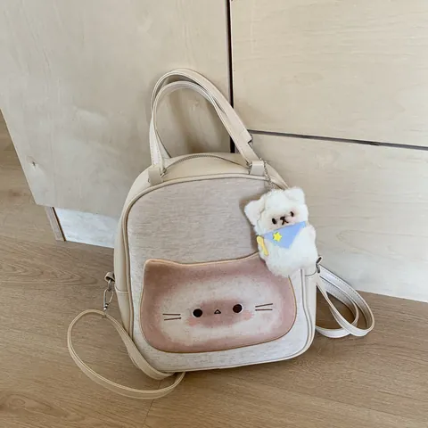 Kawaii Toast Katzengesicht Mehrzweck Rucksack Für Damen Süße Creme PU Leder Studenten Pendeltasche Mit Bärenanhänger