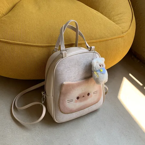 Kawaii Toast Katzengesicht Mehrzweck Rucksack Für Damen Süße Creme PU Leder Studenten Pendeltasche Mit Bärenanhänger