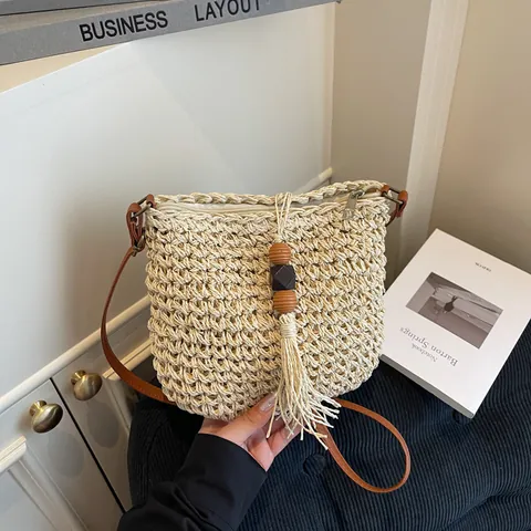 Women Hand Woven Straw Crossbody Bag With Tassel Wood Bead Summer Beach Vacation Shoulder Bag Lightweight Zipper Purse