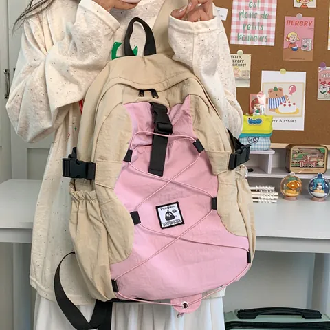 Sac à Dos Coréen en Nylon Léger Bloc de Couleur Femmes Hommes Grande Capacité Voyage Randonnée École Avec Logo Pingouin
