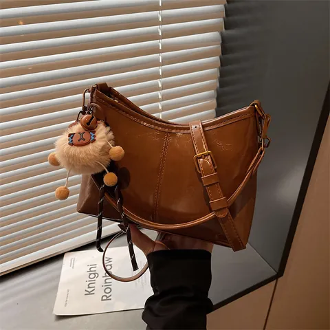 Minimalist Women PU Leather Underarm Bag Shiny Lacquer Shoulder Crossbody Bag With Plush Charm For Students Daily Commute