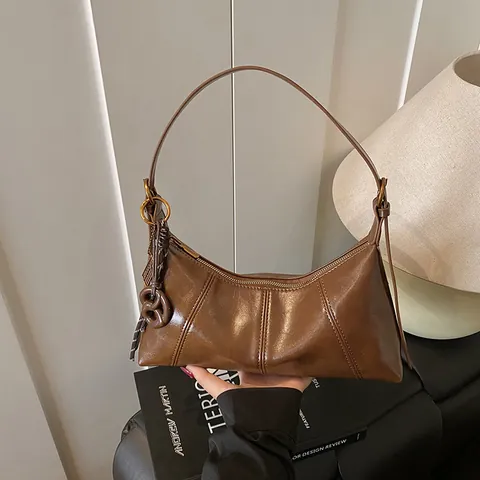 Bolso de Axila de Cuero de PU Vintage para Mujer Bolso de Hombro Minimalista de Color Sólido Con Colgante Bolso de Mano de Moda Cremallera Baguette