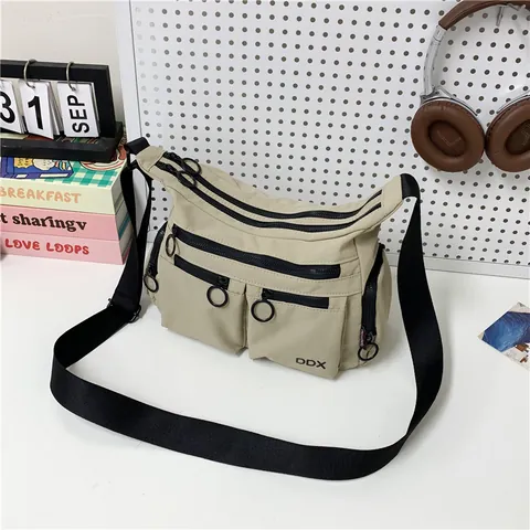 Sac Bandoulière Décontracté en Tissu Oxford Grande Capacité Multi Poches Sac À Épaule Streetwear Navettage Messager Fermeture Éclair À Anneau
