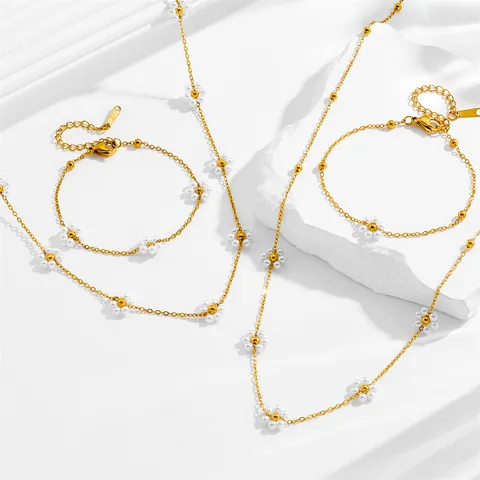 Edelstahl Vergoldet Künstliche Perle Blume Halskette Armband Elegant Minimalistisch Gänseblümchen Anhänger Schmuck Für Damen Hochzeit