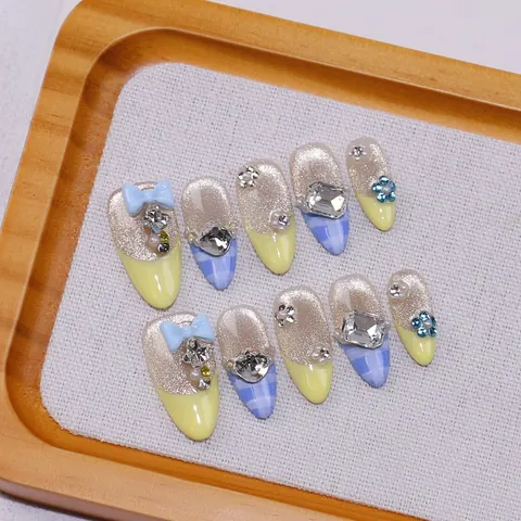 Unghie Finte da Applicare di Lusso Occhio di Gatto Fatte a Mano Blu Giallo Francese Forma a Mandorla Fiocco 3D Strass Künstliche Perle